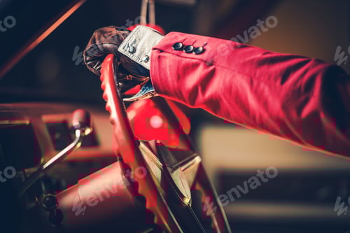 Preview: Elegant Classic Car Driver