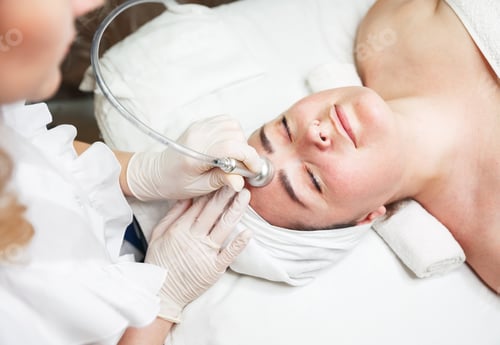 Preview: Cosmetologist uses a special device to rejuvenation procedure