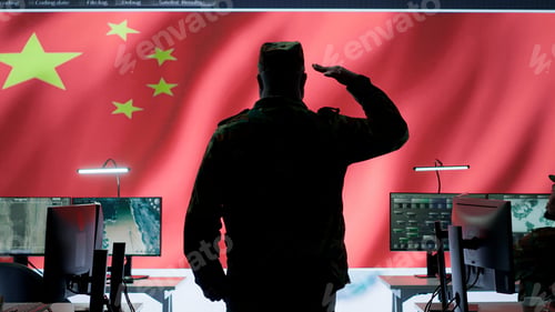 Preview: Chinese military officer in uniform monitors critical data on big screen