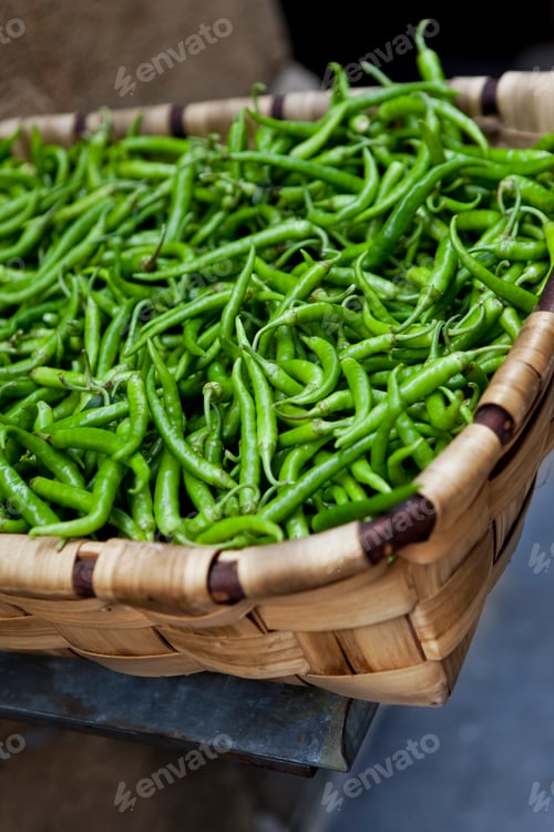Preview: Green peppers in a wicker basket