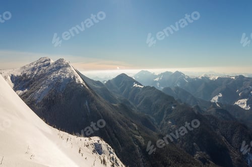 Preview: Beautiful winter landscape. Steep mountain hill slope with white deep snow,