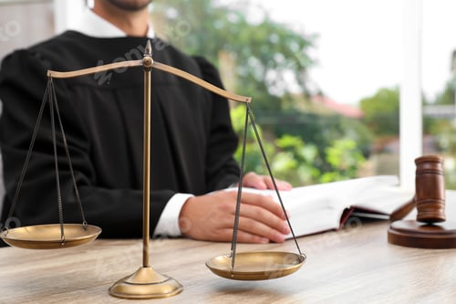 Preview: Scales of justice and blurred judge on background. Criminal law