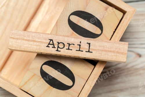Preview: top view of parts of wooden calendar on dark wooden tabletop