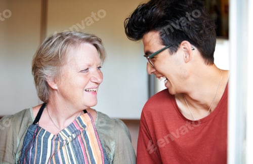 Preview: Young guy sharing a joke with his mom at home