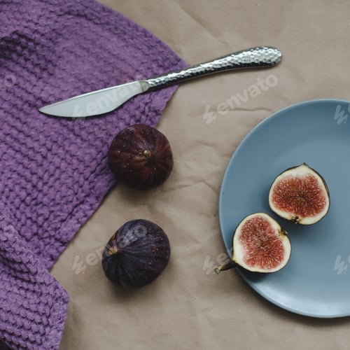 Preview: Rustic still life with fresh ripe figs.