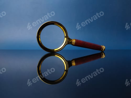 Preview: Reflection vintage magnifying glass on a black acrylic board