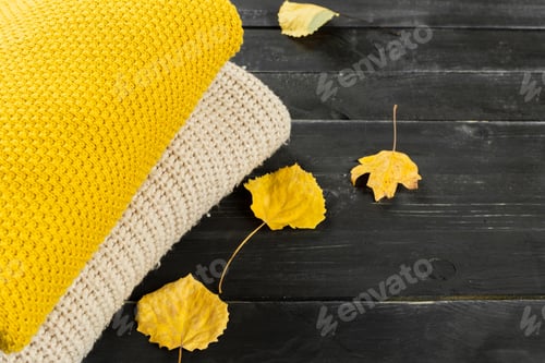 Preview: Stack of cozy knitted sweaters