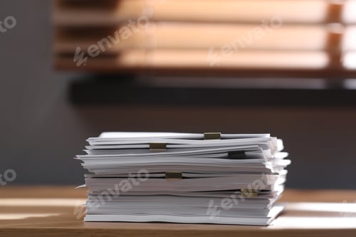Preview: Stack of blank paper with binder clips on wooden table indoors. Space for text