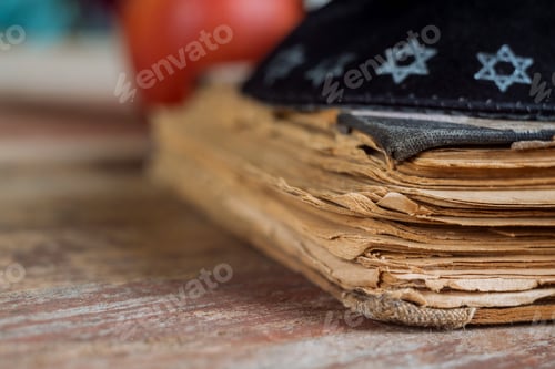 Preview: The Jewish hebrew prayer book on a synagogue with kippah