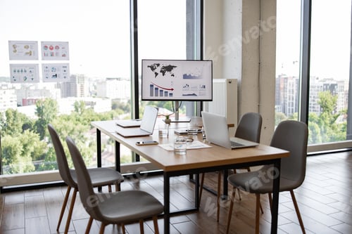 Preview: Modern office conference room with charts and graphs displayed