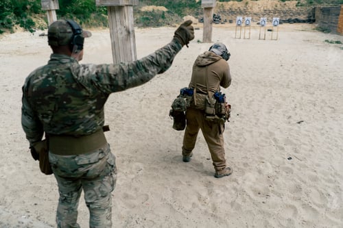 Preview: military tactical strategy rifle position for training on a professional shooting range trainer in