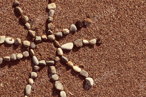 Preview: The Sun On The Sand In The Summer Is Lined With Stones