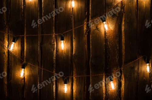 Preview: Designer light bulbs on dark wooden background