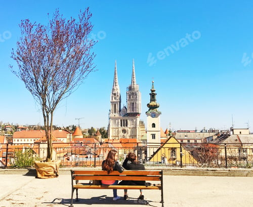 Preview: Two friends on a bench while visiting Croatian capital