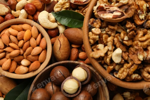 Preview: Wooden bowls with different nuts, close up