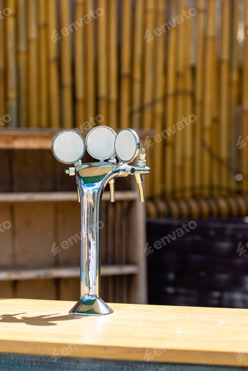 Preview: Beer tap in bar, mock up with selective focus.