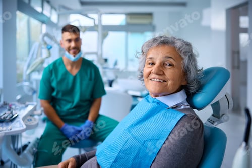 Preview: Senior woman feeling satisfied with her teeth after dental procedure and looking at camera.