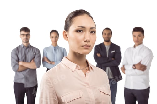 Preview: portrait of asian businesswoman standing in front of her colleagues isolated on white
