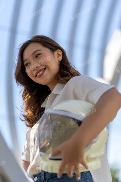 Preview: woman smiling with her astronaut helmet