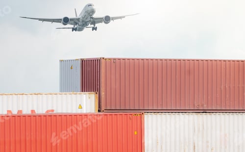 Preview: Air logistics. Cargo airplane flying above stack of logistic container. Cargo and shipping business.