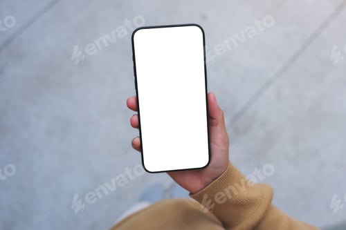Preview: Top view mockup image of a woman holding mobile phone with blank desktop white screen