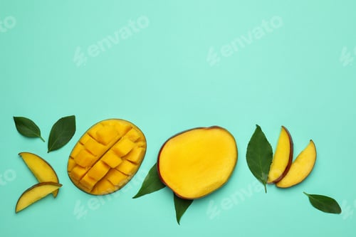Preview: Tasty ripe mango fruit on mint background