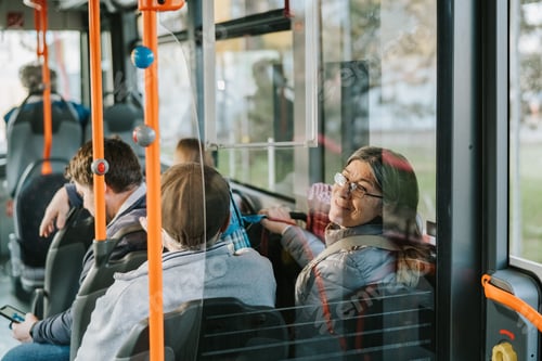 Preview: Senior couple using public transport in Geneva city
