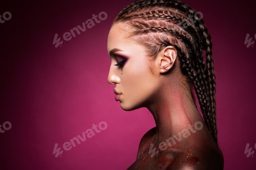 Preview: Portrait of beautiful woman with sparkles on her face.