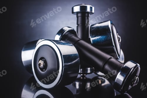 Preview: close-up view of various dumbbells and reflection, sport and healthy lifestyle concept
