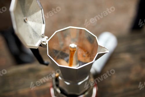 Preview: Process of making camping coffee outdoor with metal geyser