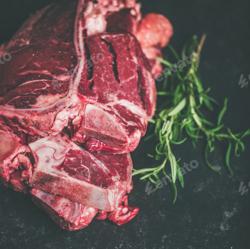 Preview: Raw beef meat t-bone steaks with rosemary, square crop