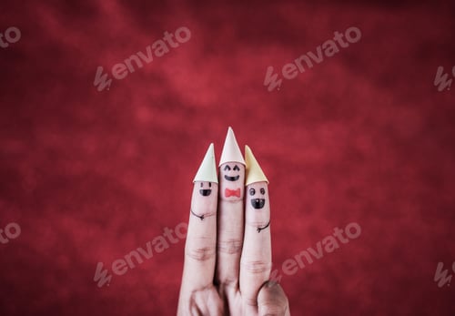 Preview: Finger with emotion on red background