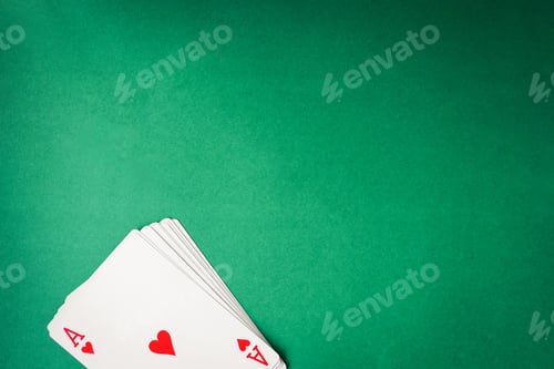 Preview: Playing cards on green background. Free space for text