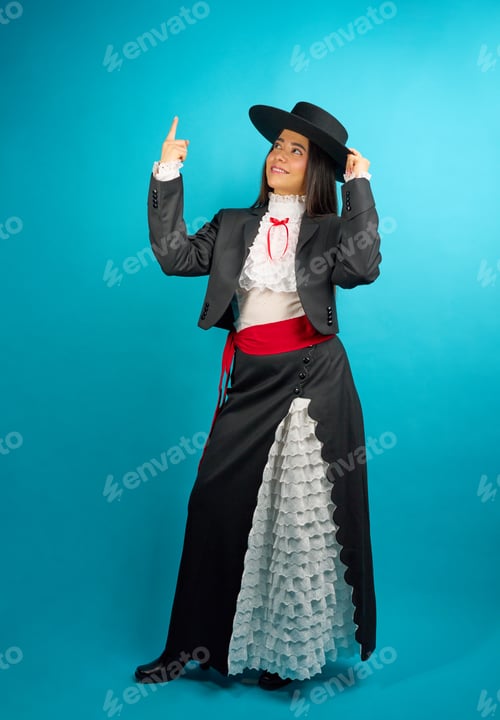 Preview: Young latina woman wearing traditional huasa clothing and hat