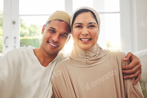 Preview: Portrait, Islam and happy couple on couch for Eid with smile, culture and love in home in Dubai. Fa