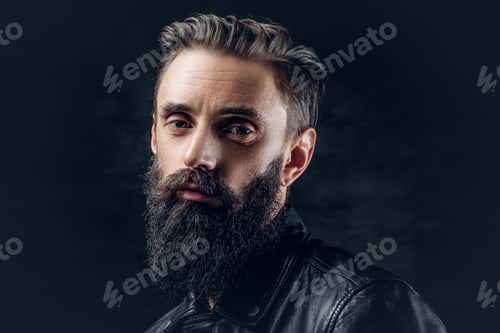 Preview: Bearded male with long hair.