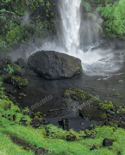 Preview: Serene waterfall with lush moss