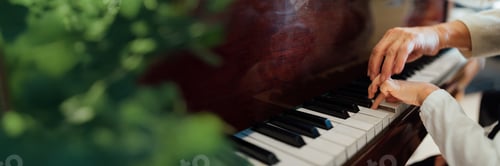 Preview: Hands Playing Piano Wide Banner with Copy Space