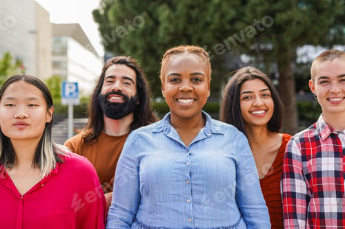 Preview: Young multiracial people having fun together in the city