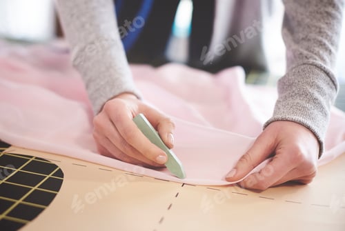 Preview: Female semastress making new patterns