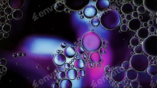 Preview: Abstract Colorful Food Oil Drops Bubbles and spheres Flowing on Water Surface