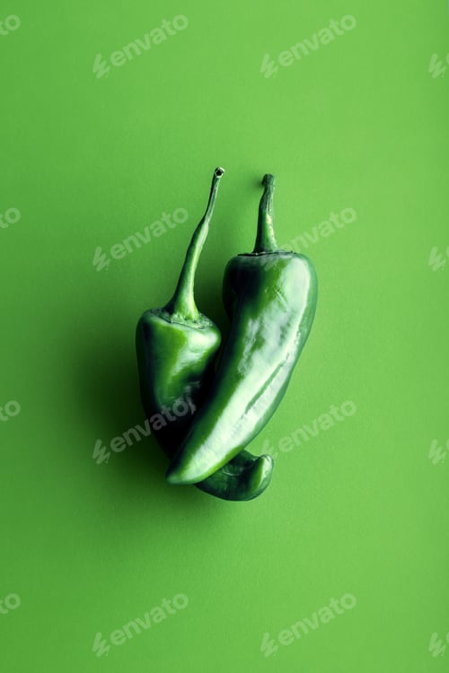 Preview: Green peppers on green background