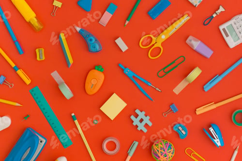 Preview: Pattern composition of school stationery on a red background. Flat lay. Back to school concept.