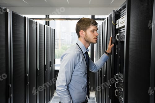 Preview: Computer technician working on a server