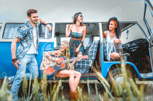 Preview: Happy friends driving a vintage minivan
