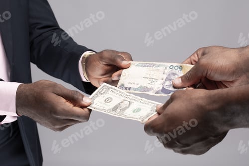 Preview: people exchanging naira and dollar