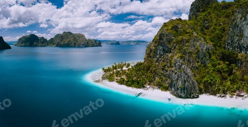 Preview: El Nido, Palawan, Philippines. Aerial drone shot of Ipil beach located on Pinagbuyutan Island