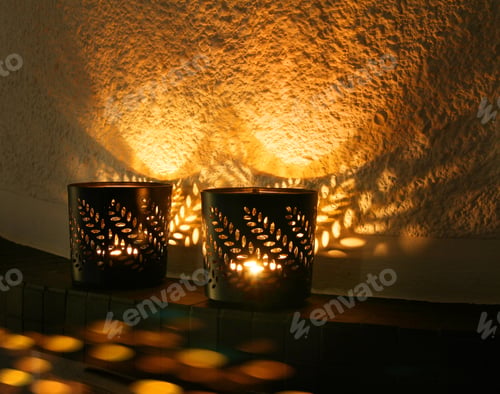 Preview: Small candle cups reflecting light