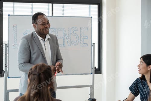 Preview: Positive friendly African American English tutor giving language courses to group of interested