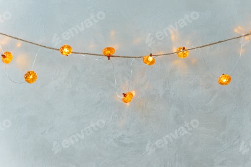 Preview: Orange Halloween Pumpkin String Lights on Grey Background